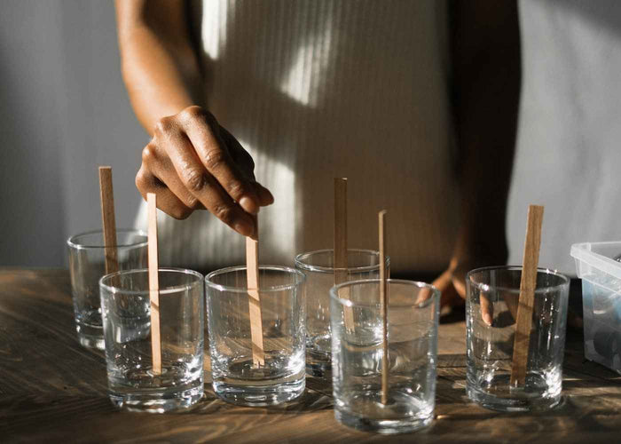 Double-sided sticker for candle wick
